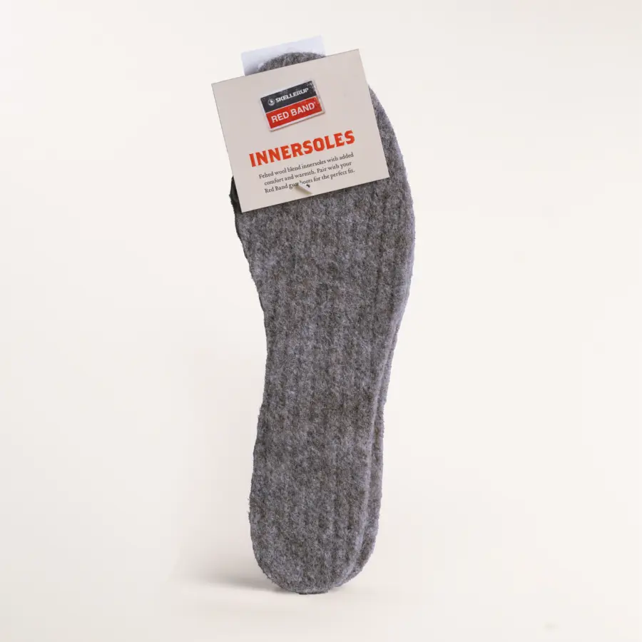 A single grey wool insole with a product tag labeled Red Band Innersoles attached to the top, displayed against a plain white background.
